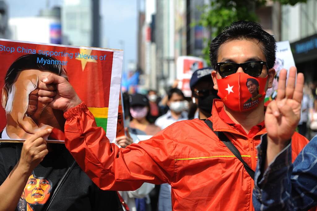 Members of human rights organizations gather to show solidarity for human rights, freedom and democracy in Asia in Tokyo, Japan on May 09, 2021. Protesters carrying East Turkestan, Myanmar, Cambodia and Mongolia flags, shout "Stop the Uighur massacre", "Freedom to East Turkistan", "Release Suu Kyi", "Help Southern Mongolia" slogans. Demonstration Japan protest Tokyo Turkmenistan Uighur Photo by David Mareuil. Anadolu Agency.